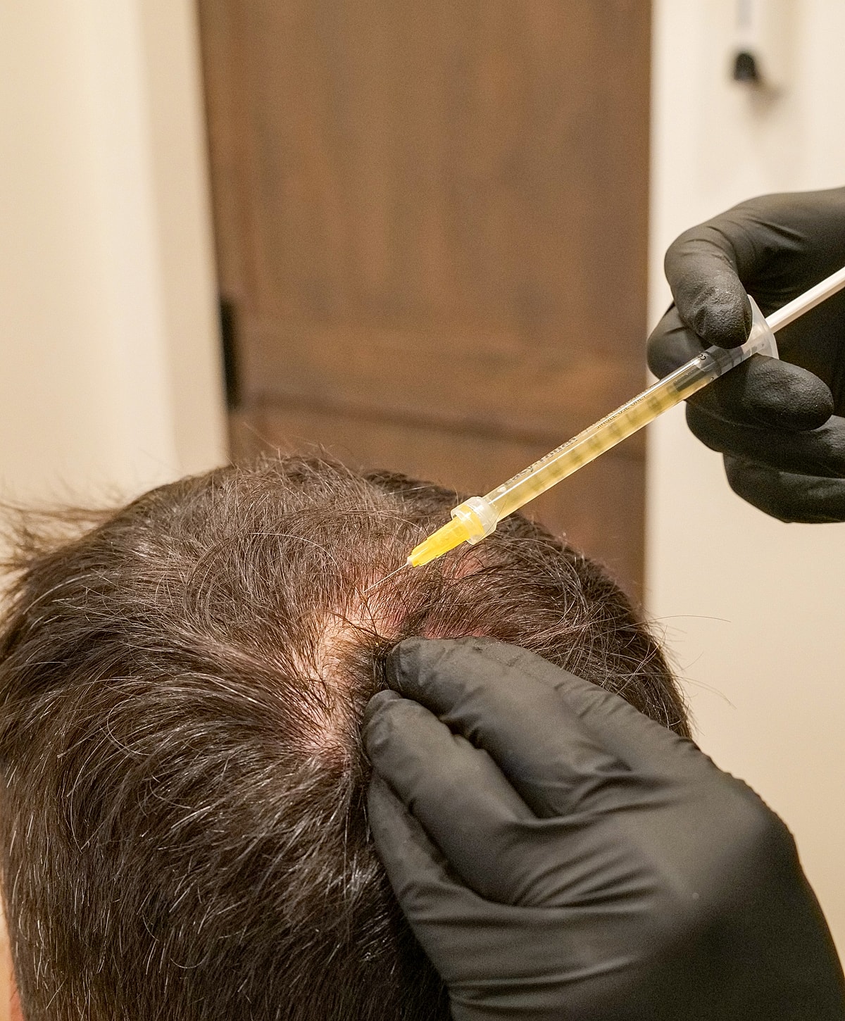 Hair treatment procedure with serum application.