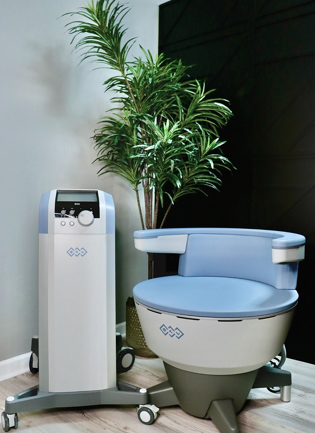 Medical equipment with a blue ergonomic chair.