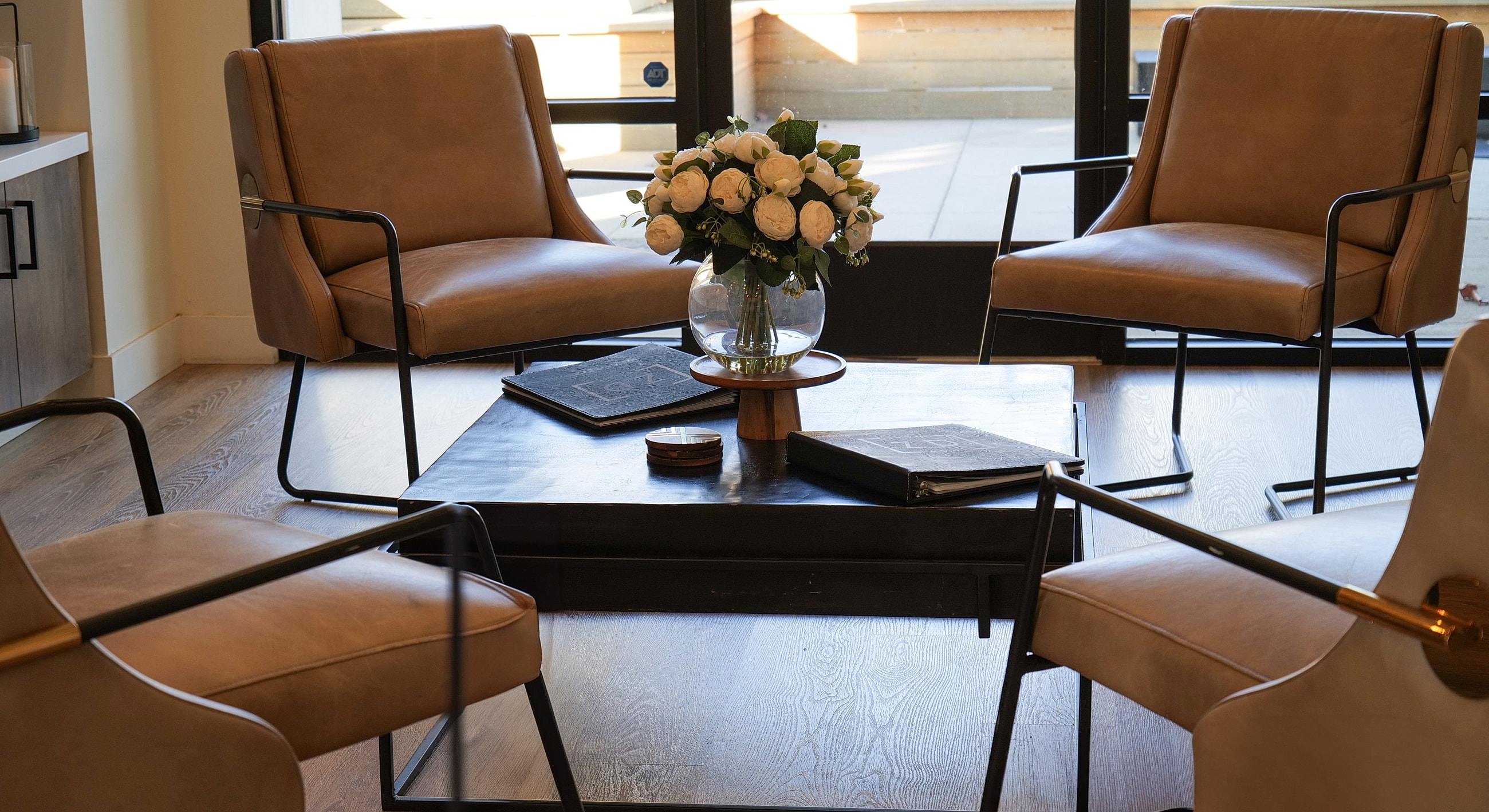 Elegant seating area with floral centerpiece.