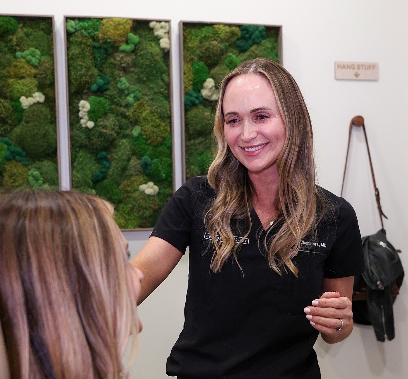 Health professional interacting with a patient.