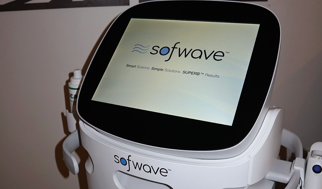 Sofwave device displaying logo and tagline.