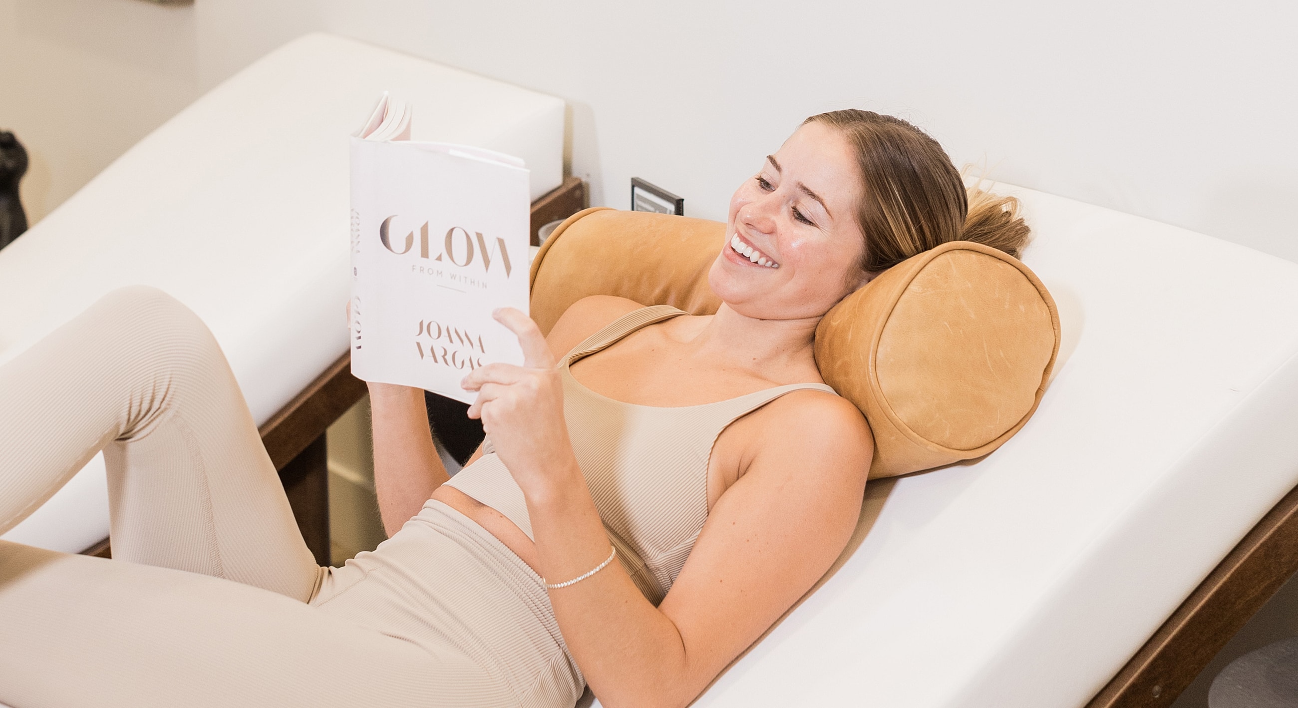 Woman reading a book while relaxing.